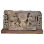 A BUFF SANDSTONE PLINTH FROM AN IMAGE, CENTRAL INDIA, 10TH/11TH carved in relief depicting a small