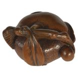 A JAPANESE WOOD NETSUKE OF A MANDARIN ORANGE, LATE EDO PERIOD, CIRCA 1850 reminiscent of a Tanba