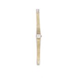 LADY'S NINE CARAT GOLD WATCH, ETERNA, CIRCA 1971 the frosted shaped square dial with gold baton