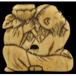 ˜A JAPANESE IVORY NETSUKE OF A SENNIN, LATE EDO PERIOD, CIRCA 1780 carved from an extremely thin