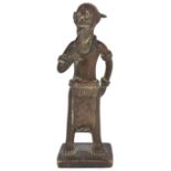 A BRONZE FIGURE OF A MAN, GHANA, PROBABLY 19TH CENTURY standing on square base, with beard and large