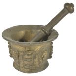 A BRONZE MORTAR AND PESTLE, INDIA, 19TH CENTURY OR EARLIER the former in the form of a flared