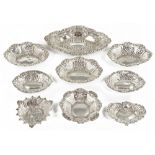 A SUITE OF NINE VICTORIAN SILVER BON-BON DISHES, T.H. HAZLEWOOD & CO., H. HAYES AND OTHERS,