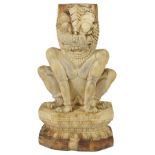 ˜AN IVORY FIGURE OF A MYTHICAL LION, SOUTH INDIA, 17TH/18TH CENTURY depicted crouching on a double