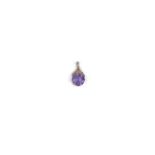 AMETHYST AND SEED PEARL PENDANT, 1900s the octagonally shaped amethyst surmounted by a foliate