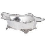 A GEORGE V SILVER FRUIT BOWL, W. & G. SISSONS, SHEFFIELD, 1912 shaped oval, engraved with a crest