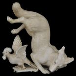 ˜A JAPANESE IVORY OKIMONO OF A WOLF AND COCKEREL, MEIJI PERIOD (1868-1912) the wolf roped to a panel