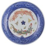 A JAPANESE PORCELAIN SMALL PLATE, EDO PERIOD, 18TH CENTURY enamelled with two confronting dragons