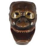 A JAPANESE PARTLY LACQUERED WOOD MASK NETSUKE OF NAMANARI, LATE EDO PERIOD, CIRCA 1820 unsigned 5.