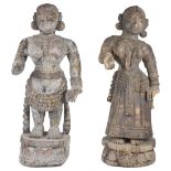 TWO CARVED WOOD FEMALE FIGURES, WESTERN INDIA, 19TH CENTURY probably musicians, each standing on a