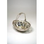 A SILVER SWEETMEAT BASKET, C.J. VANDER LTD., SHEFFIELD, 1997 pierced and engraved oval in Dutch