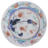 A JAPANESE PORCELAIN PLATE, EDO PERIOD, LATE 17TH / EARLY 18TH CENTURY painted in a Kakiemon palette