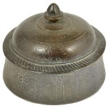 A MUGHAL BRASS PAN DAN, NORTHERN INDIA, 18TH CENTURY of flared cylindrical form, the domed lid