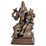 A BRONZE SHRINE DEPICTING LAKSHMI-NARAYANA, SOUTH INDIA, CIRCA 18TH CENTURYthe four-armed god Vishnu