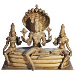 VISHNU WITH SRIDEVI AND BHUDEVI, SOUTH INDIA, 20TH CENTURYbronze, the Hindu trio seated in