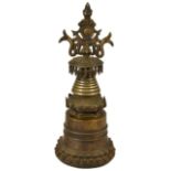 A BRONZE STUPA, TIBET, 18TH CENTURYin Pala style, the drum with lotus base and sealing plate