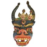 A PAINTED RITUAL MASK, TIBET, 20TH CENTURYcloth and papier-mache composition, in the form of a