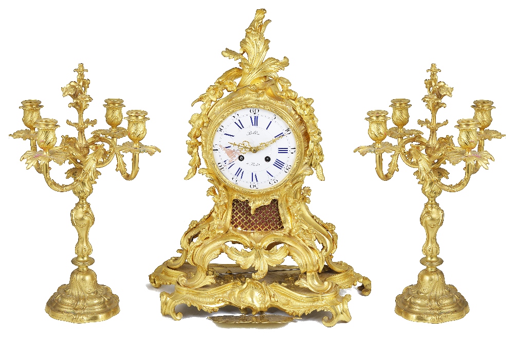 A MATCHED THREE-PIECE GILT-BRONZE CLOCK GARNITURE, FRENCH, CIRCA 1900the clock with eight-day