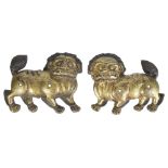 A PAIR OF COPPER-GILT RELIEFS OF LIONS, TIBET, 16TH/17TH CENTURYprobably from a shrine, each with