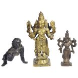 THREE BRONZE IMAGES OF HINDU DEITIES, SOUTH INDIA, 19TH CENTURYcomprising a brass figure of