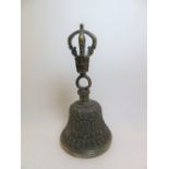 A BUDDHIST RITUAL BELL, TIBET, 19TH CENTURYcast brass, iron and bell metal, the handle in the form