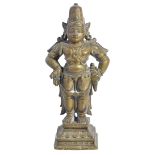 A BRONZE FIGURE OF VITHOBA, DECCAN, SOUTHERN INDIA, 19TH CENTURYstanding on a rectangular base,