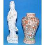 A Chinese porcelain blanc de chîne figure of Guan Yin, 9"; a similar baluster shaped vase, 6½"