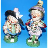 A pair of 19th century Mansion House dwarf figures with cavalier apparel and exaggerated hats,