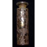 A 1930's cylindrical scent bottle by Lalique "Rally Forvil", embossed in upper case 'R Lalique