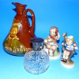 A Royal Doulton "Ben Johnson" jug; 2 Hummel figures; a silver top scent bottle; a 19th century