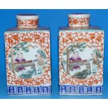 A pair of "Chinese Imari" square caddy shaped covered vases decorated with circular polychrome