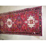 A middle eastern hand knotted runner, 26" x 112"