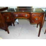 A 19th century Georgian style mahogany dressing table with concave front and 3 drawers; on square