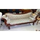 A William IV mahogany double scroll end couch on octagonal tapering legs