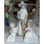 A Lladro figure of an angel, 6¼"; 2 Nao figures