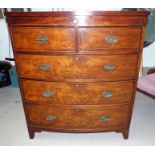 A 19th century figured mahogany bow front chest of 3 long and 2 short drawers with boxwood line