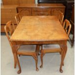 A period style figured walnut dining suite comprising draw leaf table, 6 (4 + 2) Queen Anne style