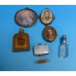 A miniature of a small girl; a Victorian brooch with picture miniature; other miniature items