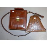 A snakeskin handbag; a brown leather shoulder bag