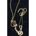 A 9 carat hallmarked gold Aries the ram pendant, 1.3 gm, on chain; a 9 carat hallmarked gold 'V'