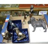 A bronze figure of a dog catching a bird; a selection of various bronzed figures