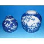 A Chinese blue and white ginger jar with panelled decoration, 4 character mark to base, 7½"; and