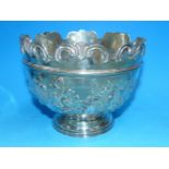 A hallmarked silver rose bowl with embossed floral decoration, London 1899, 14 oz