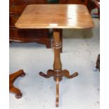 A Victorian mahogany rectangular pedestal occasional table on baluster column and 3 splay feet,