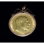 A 1905 half sovereign in clip pendant mount, stamped '9CT', 5 gm gross