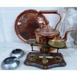 A set of 19th century postage scales and weights; a reproduction lantern clock; a copper kettle;