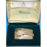 A Ronson Varaflame Adonis cigarette lighter with 9 carat hallmarked gold casing, original box with