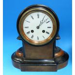 A late 19th century walnut and ebony cased mantel clock