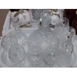 A cut glass ship's decanter with etched floral decoration, a smaller decanter, 2 large and 4 small