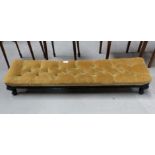 A 19th century long low kneeler/footstool with buttoned dralon top and knurled feet